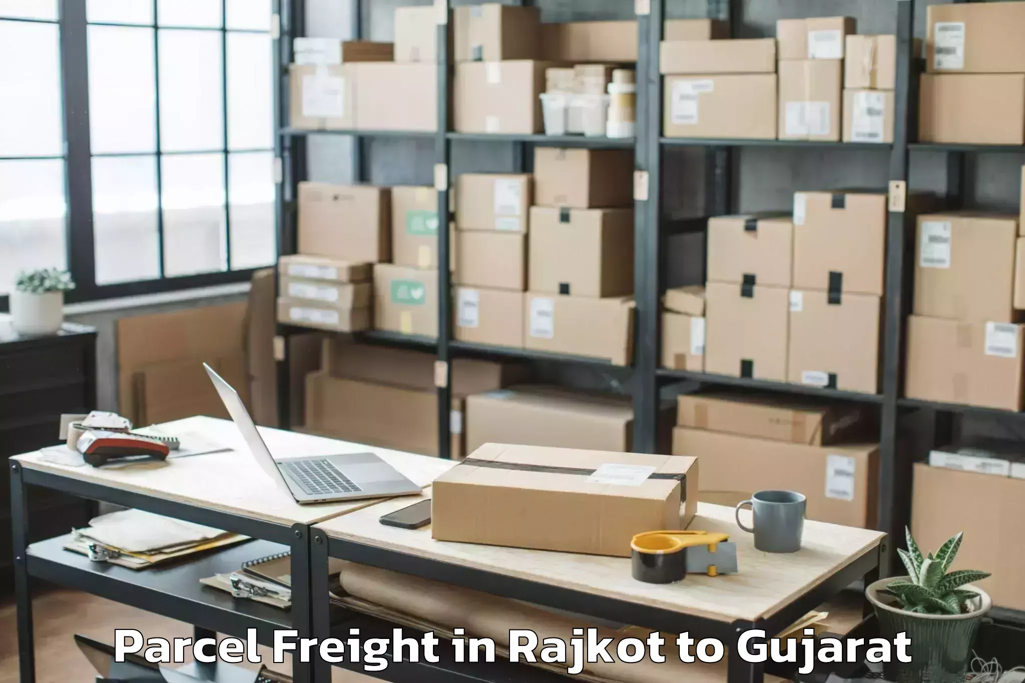 Comprehensive Rajkot to Kamdhenu University Gandhinaga Parcel Freight